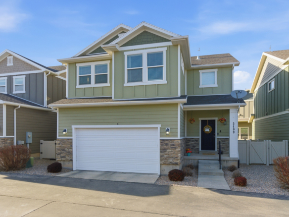 front exterior of home in Herriman Utah with finished basement and mountain views
