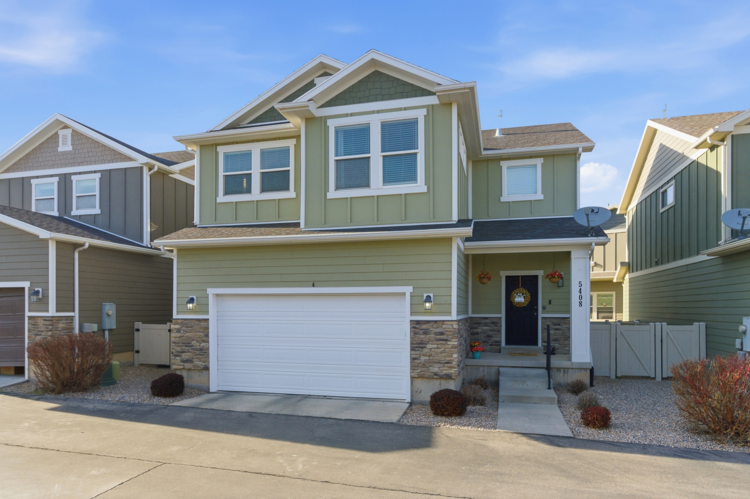 front exterior of home in Herriman Utah with finished basement and mountain views